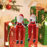 Maxbell Resin Sitting Santa Figurine Collectible Ornament for Desktop Bedroom Indoor Left holding tree