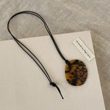 Maxbell Comb Necklace Unique Trendy Long Sweater Necklace for Girlfriend Women Girls Oval Leopard print