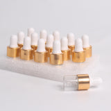 Maxbell 15 Pieces Glass Dropping Bottles Portable Refillable for Perfume Storage 2ml Clear Golden
