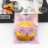 Maxbell 100pcs Clear Cookie Biscuits Snack Candy Gift Packaging Bag Bowknot Pink