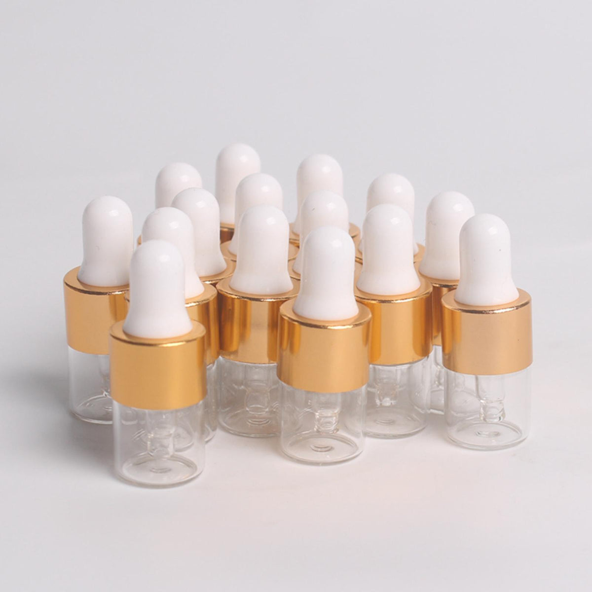 Maxbell 15 Pieces Glass Dropping Bottles Portable Refillable for Perfume Storage 1ml Clear Golden