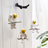 Cute Astronaut Figurines Toys Gifts Home Living Room Nursery Wall Decor sitting on swing