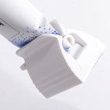 Toothpaste Squeezer Rolling Tube Dispenser Toothpaste Holder Stand White