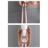 Automatic Toothpaste Dispenser Squeezer Toothbrush Holder Pink